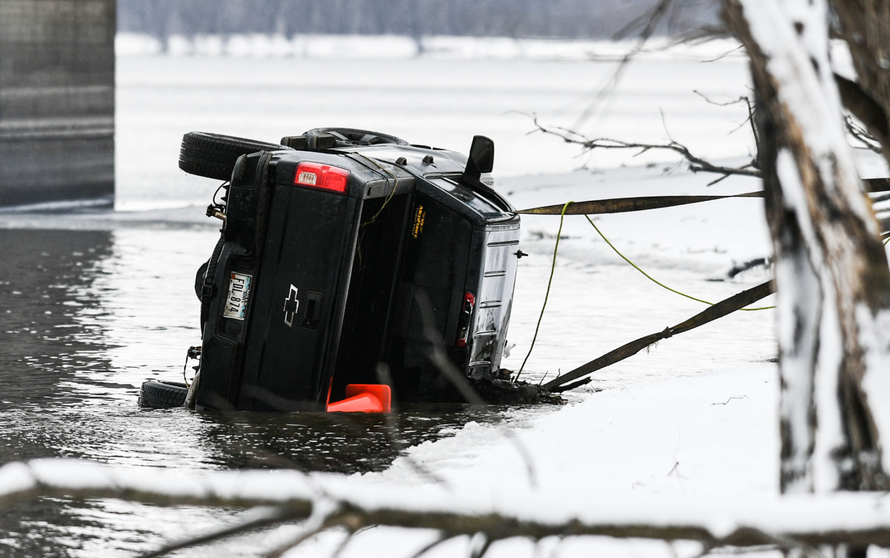 Truck goes in river